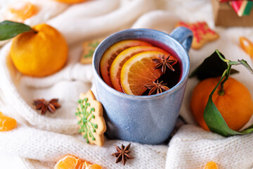 Mulled wine with oranges and anise in a cup