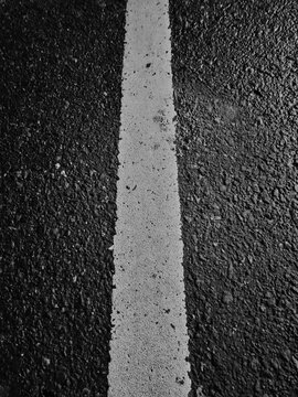 white line marking on asphalt