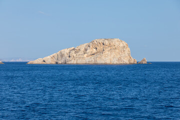 Rock island on Aegean Sea. Greece.