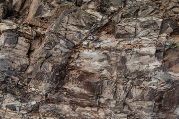 Cracked rocks, shale stone rock texture closeup