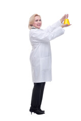 Beautiful women doctor medical suit holding beaker