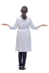 Female health care worker from the back - looking at something