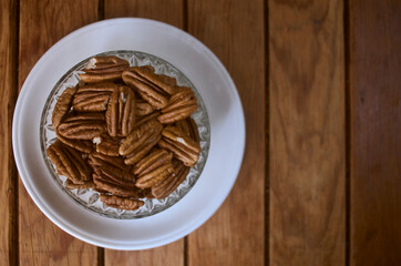 peeled pecan nuts on a bol