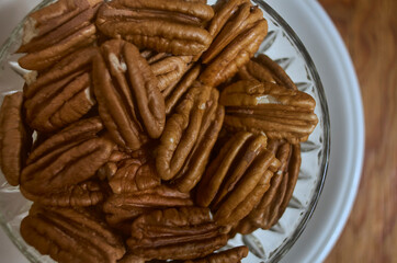 peeled pecan nuts on a bol