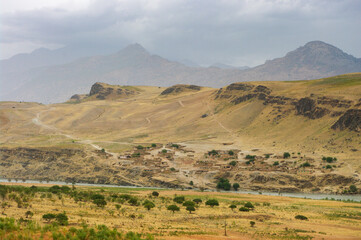 A village on the Afghan side of the border with Tajikistan in Panj river valley, Darvaz district, Gorno-Badakshan Pamir mountain region of Tajikistan