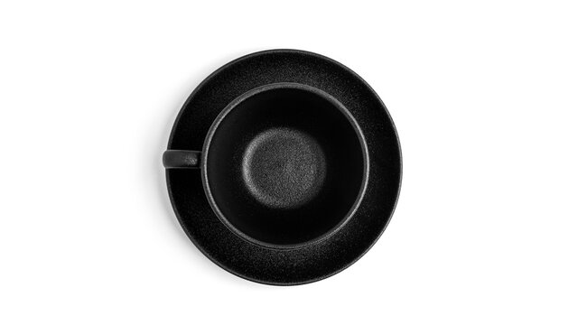 Empty black cup and saucer on a white background. High quality photo