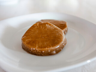Seitan to be cooked in a white dish. Vegan, high-protein