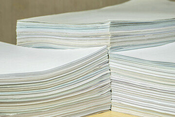 bundles bales of paper documents. stacks packs pile on the desk in the office