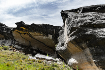 black and white rock forming a cave in castle hill new zealand