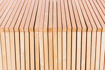 Wooden narrow planks background close up