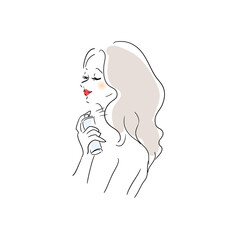 ヘアスタイリングする女性　ヘアスプレー