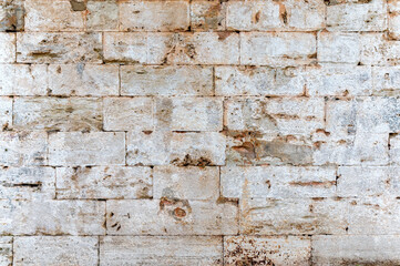Close-up of old white bricks stonewall texture background
