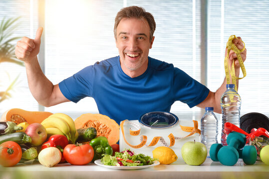 Healthy food and sport with sportsman and window in background