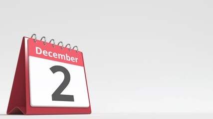 December 2 date on the flip desk calendar page, blank space for user text, 3d animation