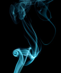 Obraz premium Swirling motion of blue smoke or fog group, abstract line isolated on black background