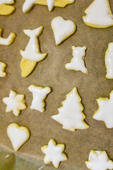 christmas cookies cutters on the table; recipe biscuit;  decorating holiday biscuits