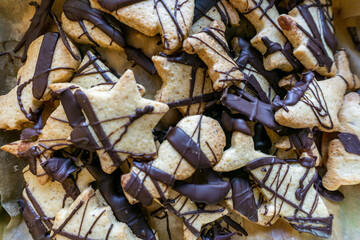 christmas cookies cutters on the table; recipe biscuit;  decorating holiday biscuits
