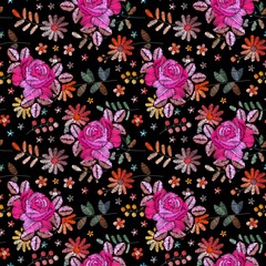 Two layered embroidery with roses on the background of wild flowers. Floral seamless pattern. Fashionable design. Print for fabric and textile.