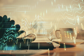 Double exposure of financial chart drawing and desktop with coffee and items on table background....