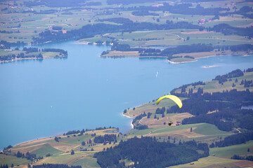 Paragliding above lake Forggensee, Füssen, Germany
