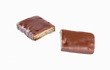 broken chocolate cacao milk piece bar on air  white isolated