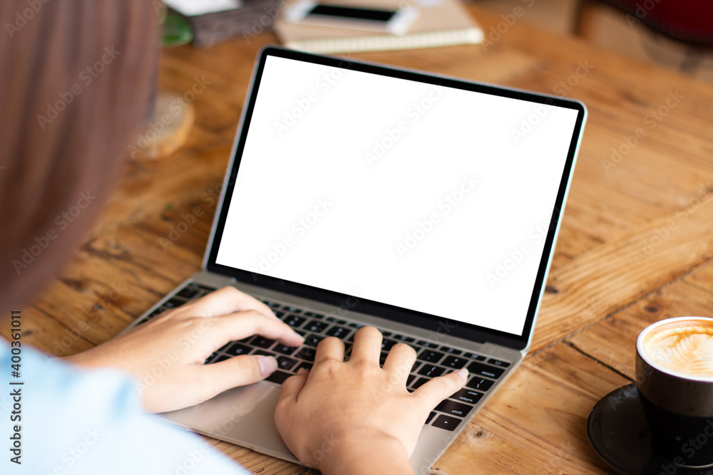 Poster working on his laptop with blank copy space screen for your advertising text message in coffee shop