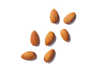 Almonds floating pieces on white isolated .almond  Image stack Full depth of field macro shot