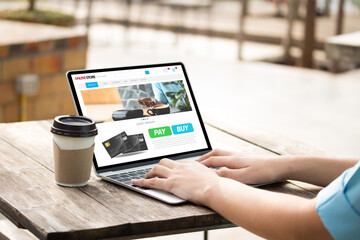 cafe making  shopping transfer payment through  app web pay with creditcard  on notebook shopping online