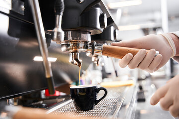 Barista making coffee preparation