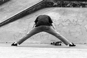 person on a skateboard black and white 