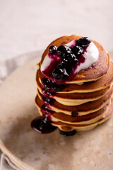 Pancakes with berry jam for breakfast