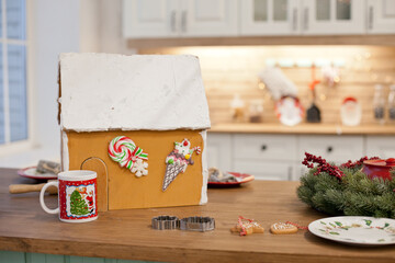 christmas gingerbread house on a table during holiday season