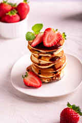 Pancakes with strawberry for breakfast
