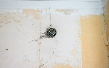 Electrical outlet in old house. Work on installing electrical outlets. Home renovation