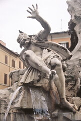 View of The Rio de la Plata statue of Fountain of the Four Rivers at Piazza Navona in Rome, Italy.