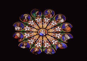 View of Stained colored glass at church Santa Maria Sopra Minerva in Rome, Italy