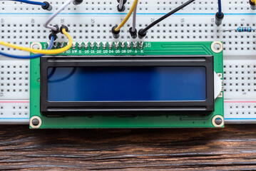 Liquid crystal display with copy space on the breadboard close up.