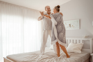 happy senior couple at new home 