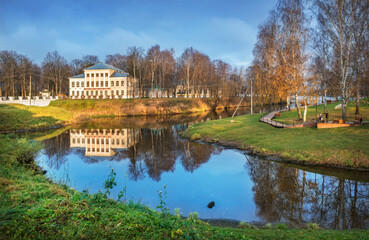 Fototapeta premium The building of the former City Duma in Uglich with reflection