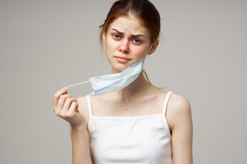 woman with medical mask runny nose infection cold health problems