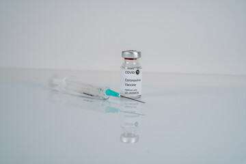 covid 19 vaccine and injector