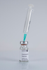 covid 19 vaccine and injector