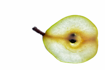Green pear slice isolated on a white background.