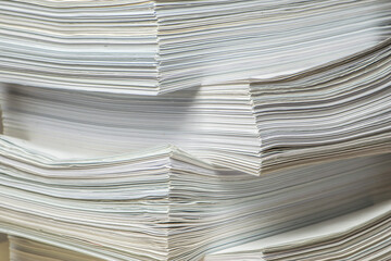 bundles bales of paper documents. stacks packs pile on the desk in the office