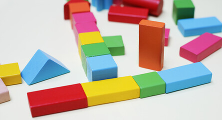 Developing colorful cubes for children.
Wooden constructor. Children's toy for the development of children.