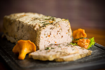 homemade sausage from minced meat with mushrooms and vegetables inside