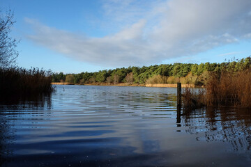 Ripples on the surface of a large lake, during a cold sunny winters morning, Surrey, UK