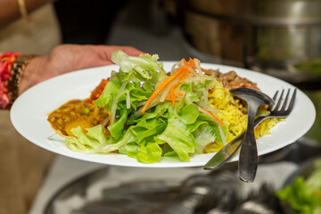 salad on a plate with fork