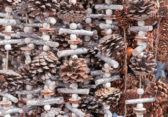 Christmas garland of pine cones, wood cuts and twigs.