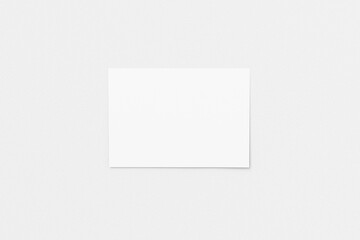 Blank white paper on white floor